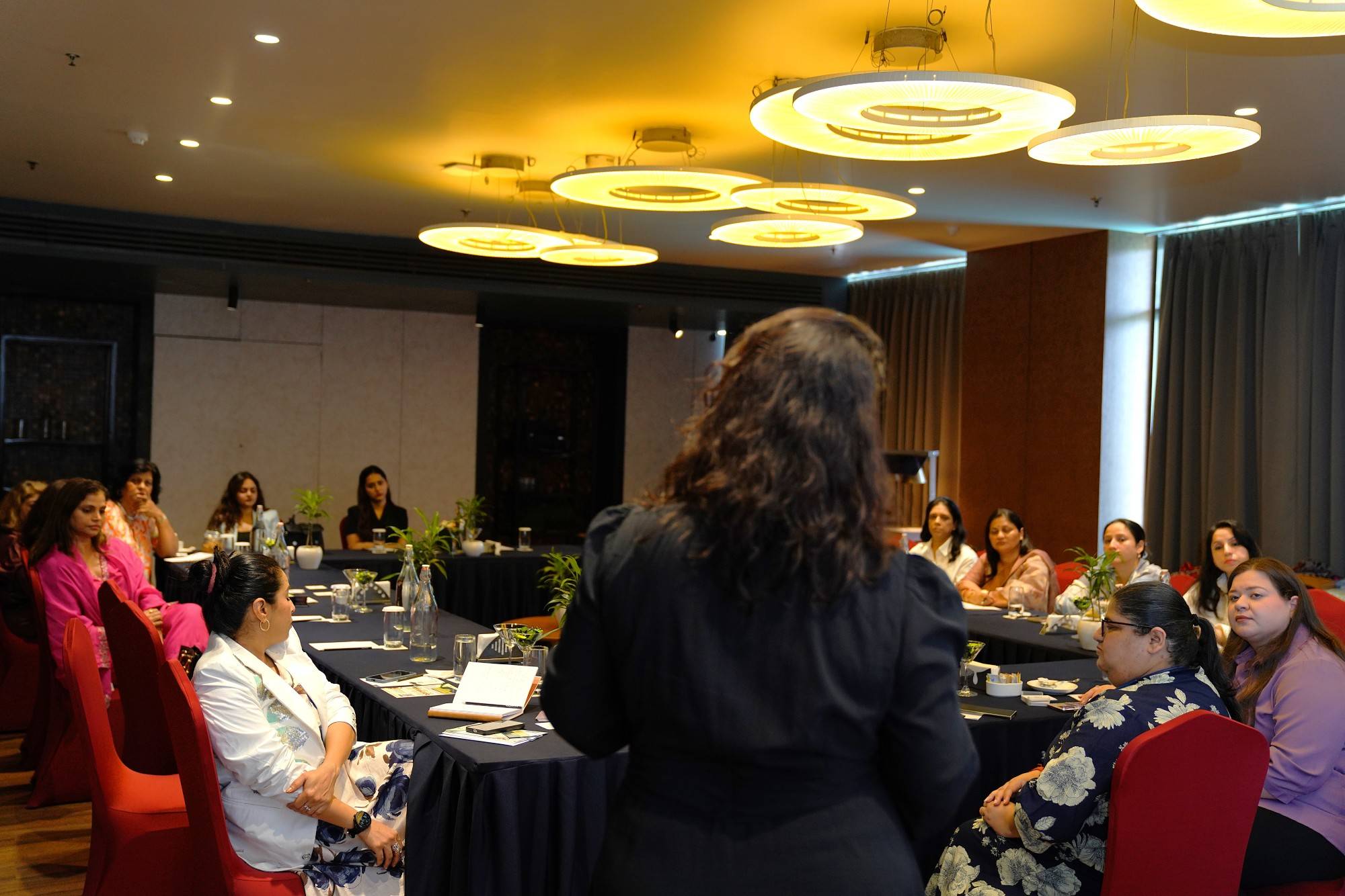 Women founders connecting at networking event